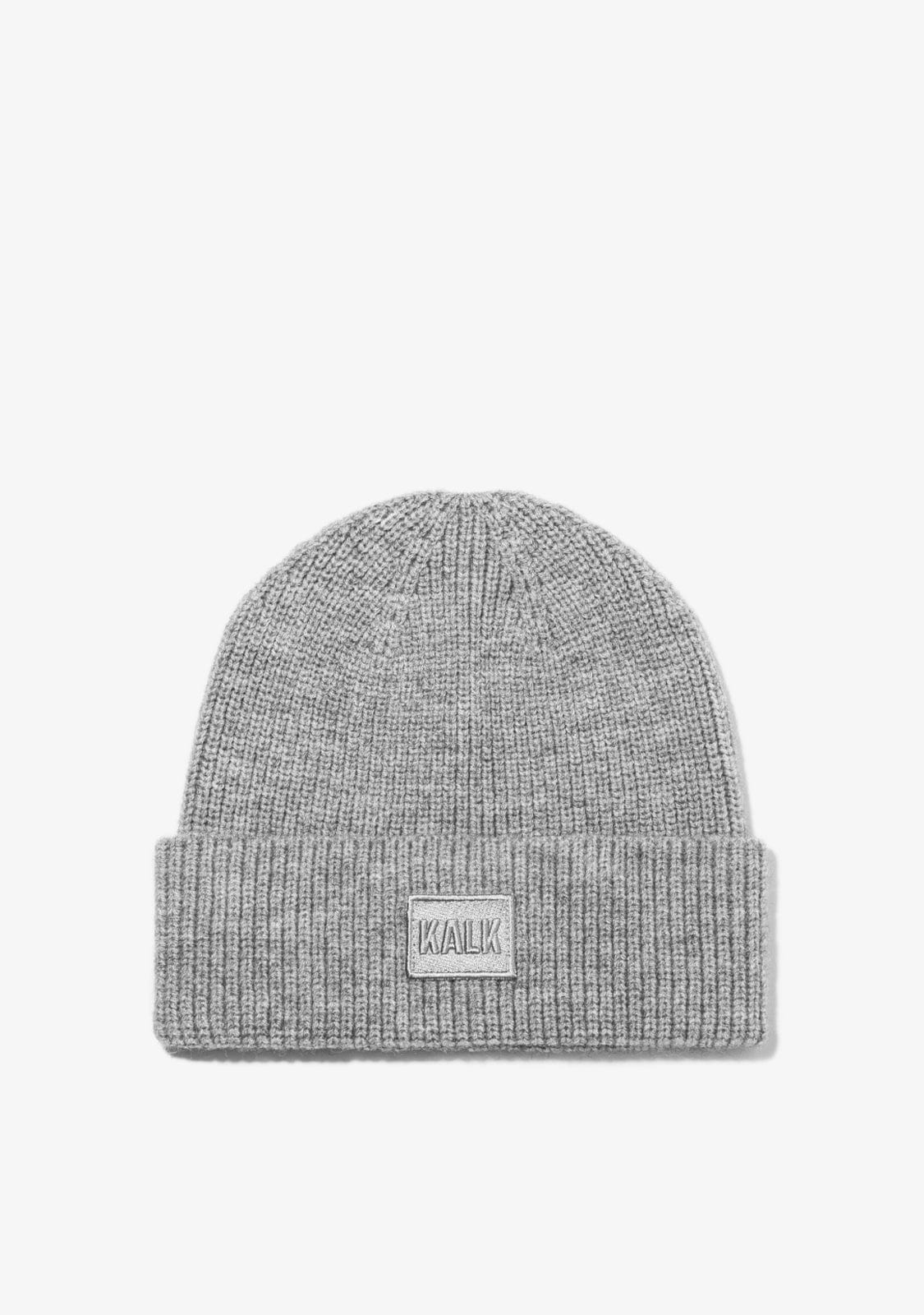 Gray knit beanie with a brand label on a light gray background